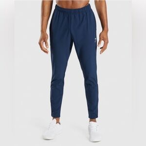 Mens Gymshark Arrival Woven Joggers in Navy